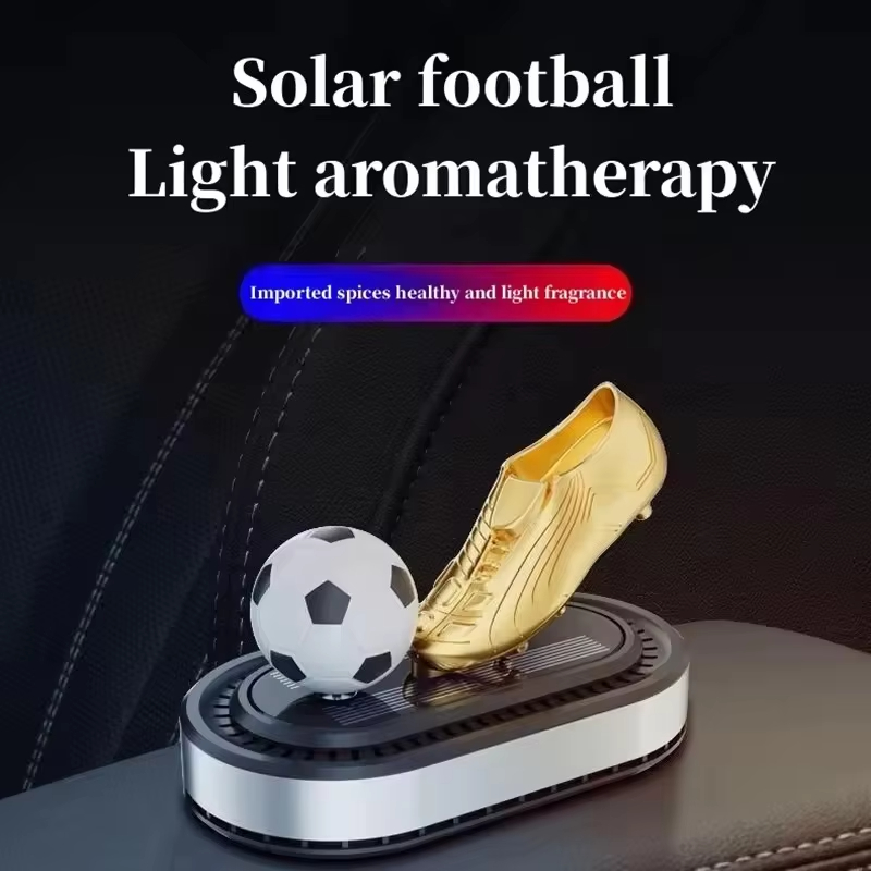Wholesale car solar rotating football golden shoes aromatherapy car football solar perfume air freshener